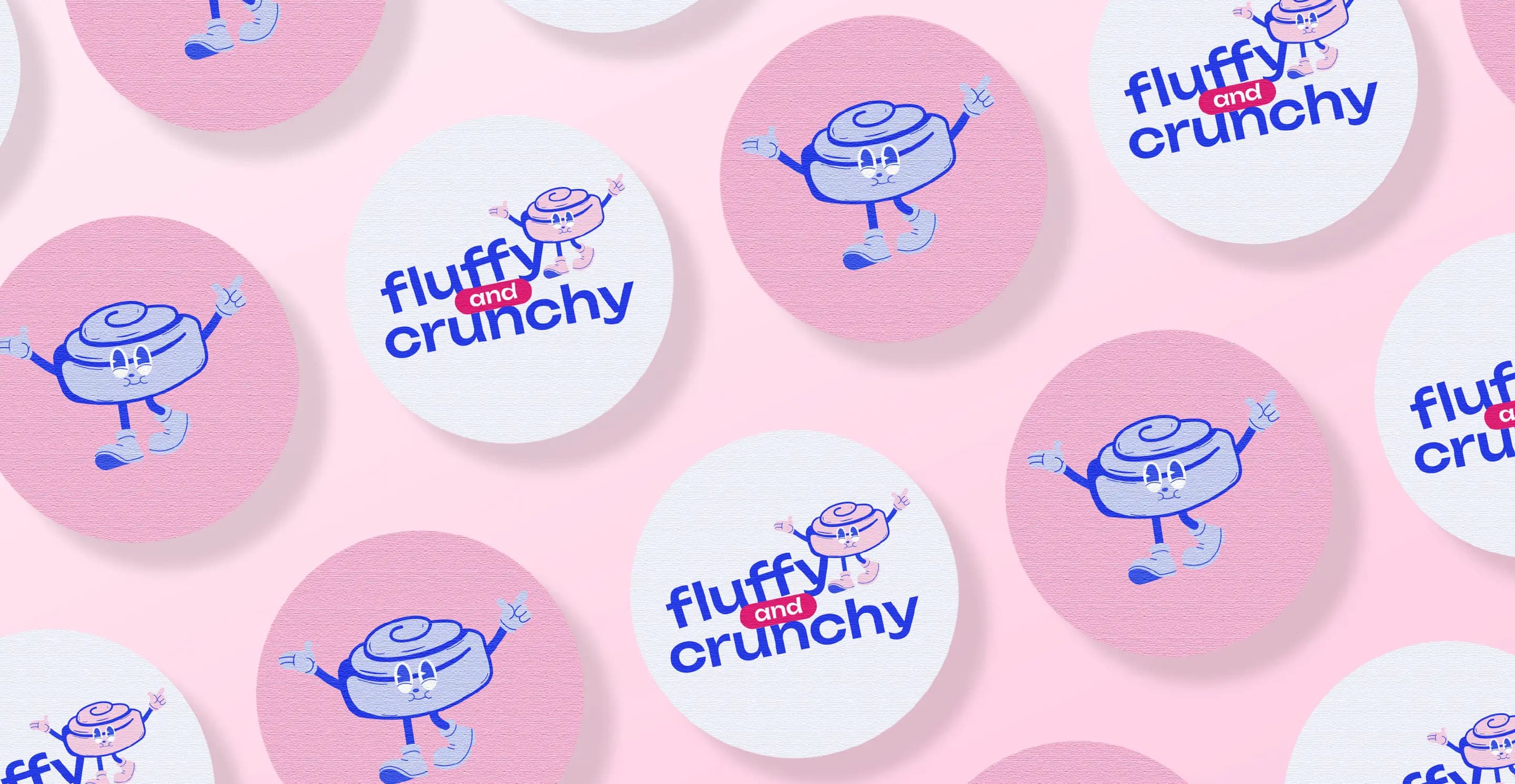 Round stickers with the mascot and the wordmark on a pink background