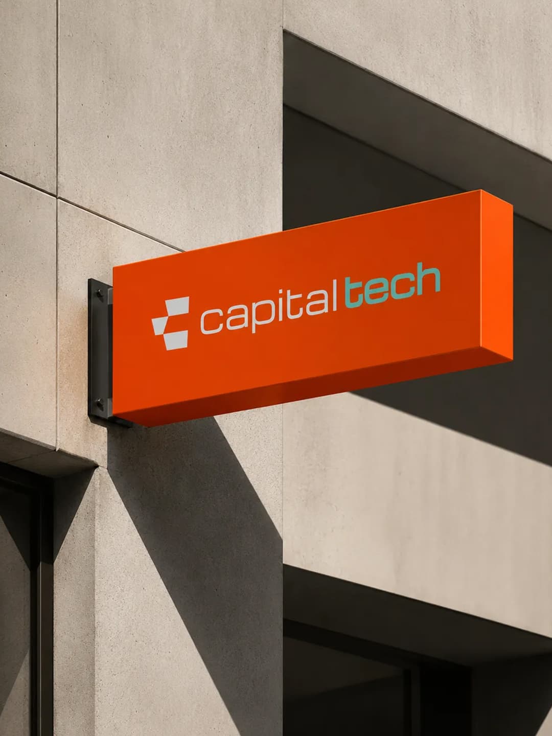 Capitaltech logo on an orange wall sign